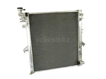 Радиатор алюминиевый MMC Triton L200 40мм AT AJS за 98 505 тг. в Алматы