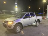 Mitsubishi L200 2011 годаүшін5 500 000 тг. в Атырау