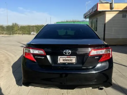 Toyota Camry 2014 года за 5 800 000 тг. в Актобе – фото 5