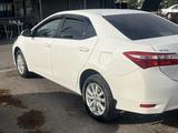 Toyota Corolla 2014 годаfor6 700 000 тг. в Алматы – фото 2