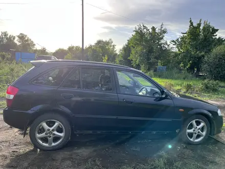 Mazda Familia 2000 года за 3 000 000 тг. в Усть-Каменогорск – фото 3