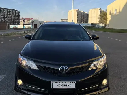 Toyota Camry 2014 года за 5 850 000 тг. в Атырау