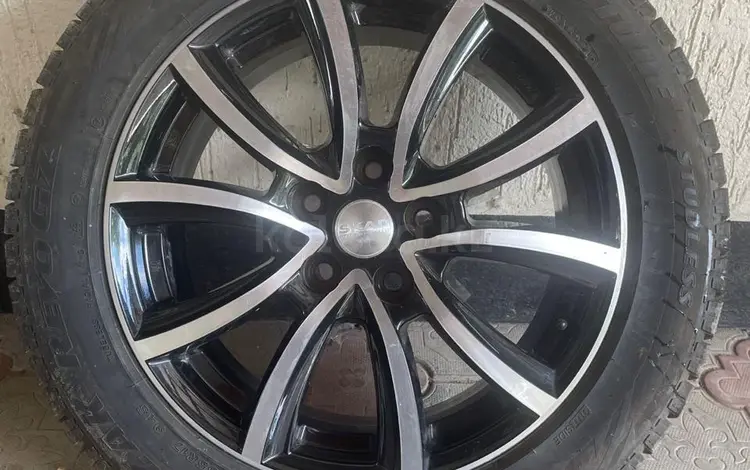 4 литые диски R17 с шинами Bridgestone Blizzak Revo GZ за 50 000 тг. в Караганда