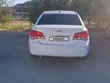 Chevrolet Cruze 2013 года за 3 200 000 тг. в Айтеке би – фото 5