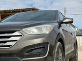 Hyundai Santa Fe 2013 годаүшін6 500 000 тг. в Жанаозен – фото 2