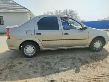 Renault Logan 2013 года за 1 800 000 тг. в Атырау – фото 2