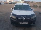 Renault Logan 2014 года за 1 900 000 тг. в Аксу