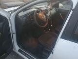 Renault Logan 2014 года за 1 900 000 тг. в Аксу – фото 3