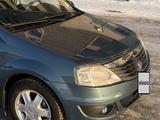 Renault Logan 2012 года за 2 650 000 тг. в Караганда – фото 5