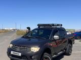 Mitsubishi L200 2012 года за 7 500 000 тг. в Актау