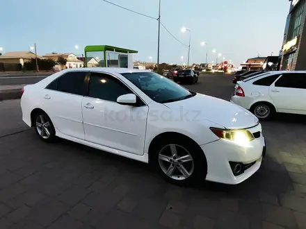 Toyota Camry 2013 года за 7 600 000 тг. в Атырау