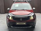 Renault Sandero 2014 года за 3 950 000 тг. в Актобе – фото 2