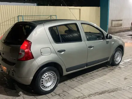 Renault Sandero 2013 года за 2 450 000 тг. в Атырау – фото 7