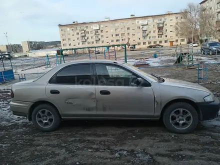 Mazda Familia 1997 года за 1 100 000 тг. в Усть-Каменогорск – фото 9