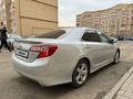 Toyota Camry 2013 года за 8 600 000 тг. в Актобе – фото 4