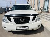 Nissan Patrol 2011 года за 12 900 000 тг. в Астана – фото 2