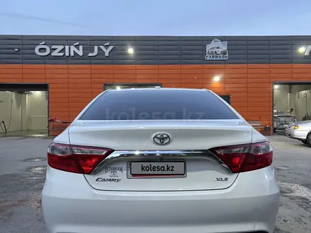 Toyota Camry 2015 года за 7 000 000 тг. в Актобе – фото 4