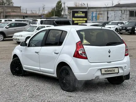 Renault Sandero 2014 года за 2 750 000 тг. в Актобе – фото 4