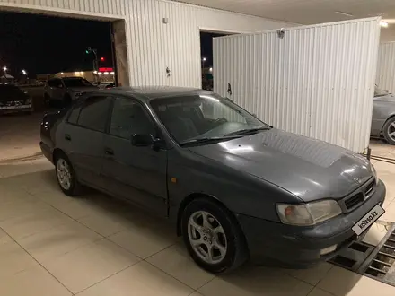 Toyota Carina E 1997 года за 1 100 000 тг. в Жанаозен – фото 2