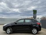 Hyundai Tucson 2012 года за 6 990 000 тг. в Актобе – фото 2