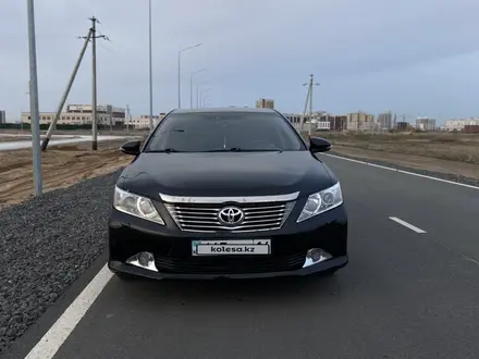 Toyota Camry 2014 года за 8 900 000 тг. в Астана