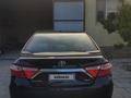 Toyota Camry 2015 года за 7 600 000 тг. в Жанаозен