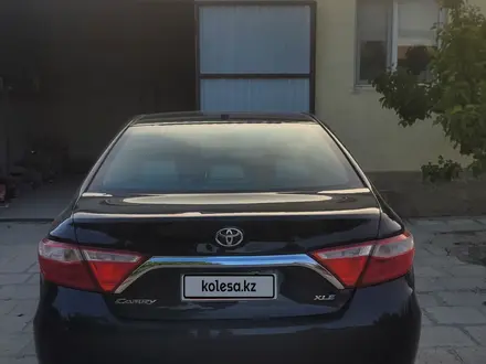 Toyota Camry 2015 года за 7 600 000 тг. в Жанаозен