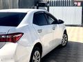 Toyota Corolla 2015 года за 6 700 000 тг. в Актобе – фото 2