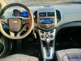 Chevrolet Aveo 2014 года за 4 500 000 тг. в Караганда – фото 4