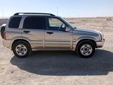 Suzuki Grand Vitara 2004 года за 3 850 000 тг. в Шолаккорган – фото 4
