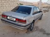 Mazda 626 1991 года за 650 000 тг. в Актау – фото 4