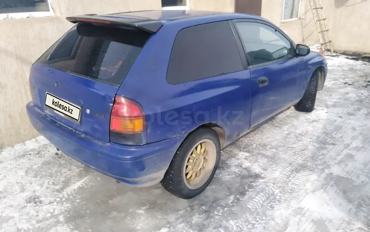 Mazda 323 1998 года за 400 000 тг. в Астана