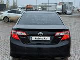 Toyota Camry 2014 годаүшін8 500 000 тг. в Уральск – фото 4