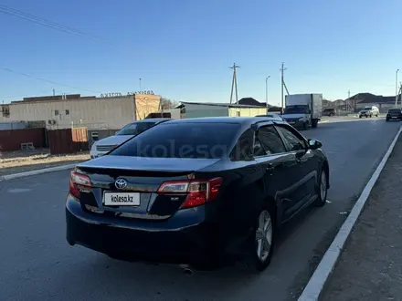 Toyota Camry 2014 года за 6 500 000 тг. в Кызылорда – фото 9