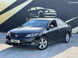 Toyota Camry 2012 года за 7 250 000 тг. в Атырау