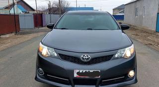 Toyota Camry 2014 года за 6 700 000 тг. в Атырау