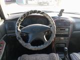 Kia Optima 2004 года за 950 000 тг. в Астана – фото 2