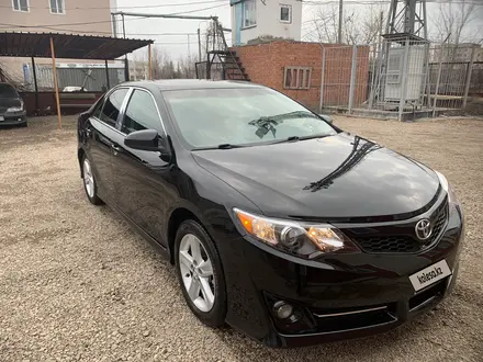 Toyota Camry 2014 года за 6 500 000 тг. в Караганда