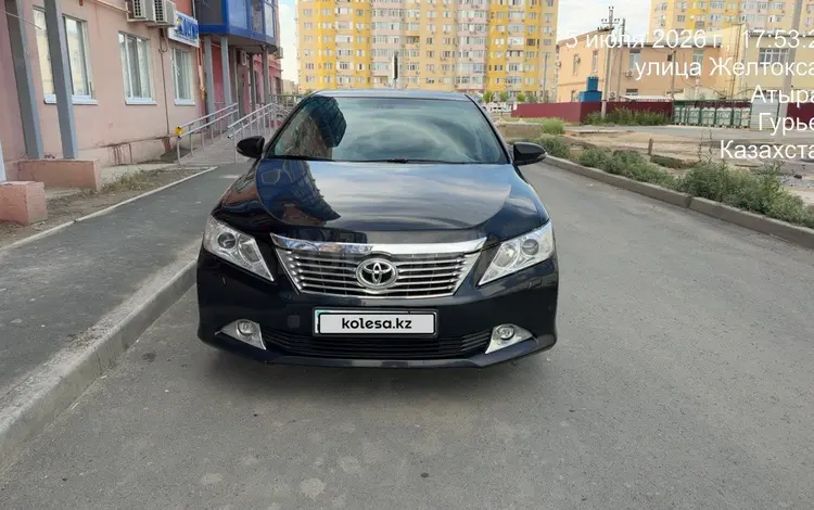Toyota Camry 2014 года за 9 500 000 тг. в Атырау