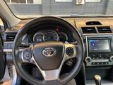 Toyota Camry 2012 года за 6 400 000 тг. в Актобе – фото 4