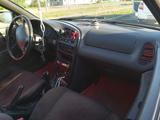 Mazda 323 1995 годаүшін1 300 000 тг. в Рудный – фото 5