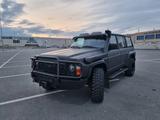 Nissan Patrol 1995 годаүшін5 500 000 тг. в Караганда – фото 5