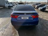 Toyota Camry 2015 года за 7 000 000 тг. в Актобе – фото 3