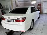 Toyota Camry 2015 года за 10 500 000 тг. в Кульсары – фото 4