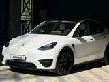 Tesla Model Y 2021 года за 18 700 000 тг. в Алматы – фото 2
