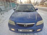 Mazda 323 2000 годаүшін1 700 000 тг. в Алматы – фото 3