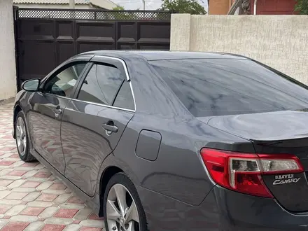 Toyota Camry 2012 года за 8 300 000 тг. в Жанаозен – фото 2