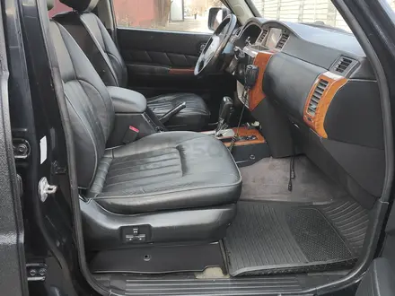 Nissan Patrol 2009 года за 14 800 000 тг. в Алматы – фото 36