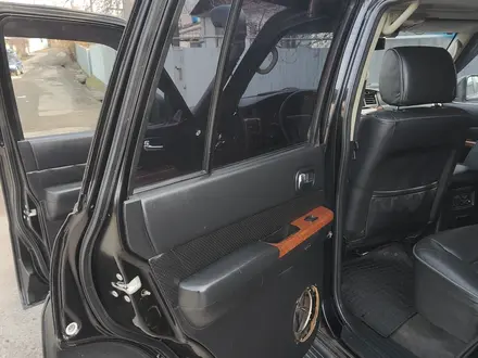 Nissan Patrol 2009 года за 14 800 000 тг. в Алматы – фото 49