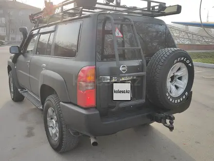 Nissan Patrol 2009 года за 14 800 000 тг. в Алматы – фото 8